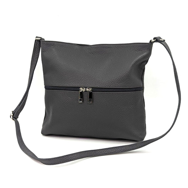 Classic medium crossbody leather bag with front zip pocket with silver hardware