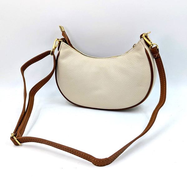 Rounded 2 tone leather bag with pipping and crossbody strap