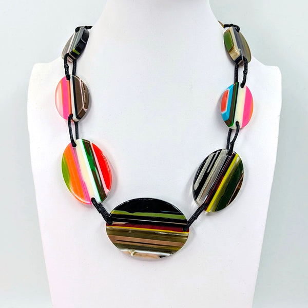 Short oval resin necklace on wax cord