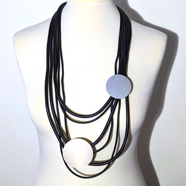 Lightweight neoprene necklace with a couple of disc elements