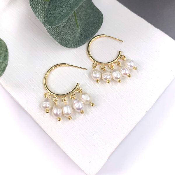 Hoop gold earrings with multi pearl drops