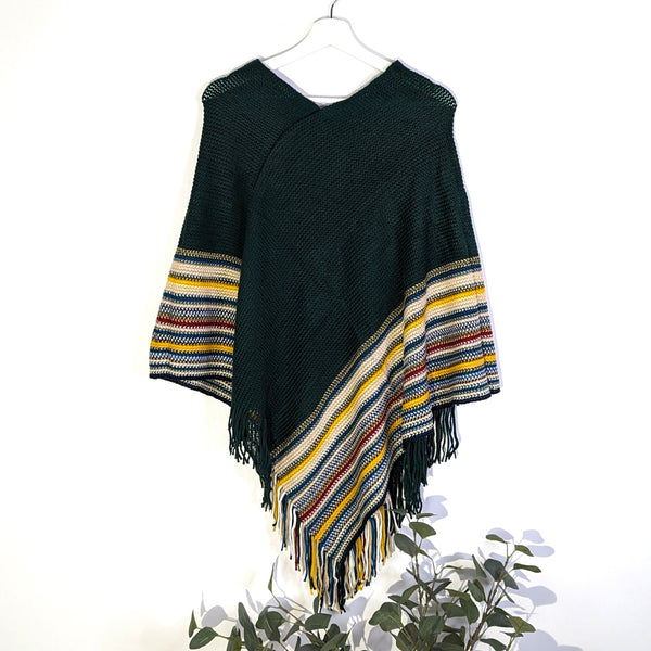 Knitted scarf with striped panels and tassels