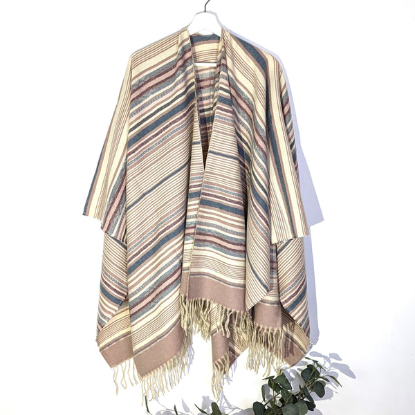 Soft stripey muted mohair feel poncho with tassels