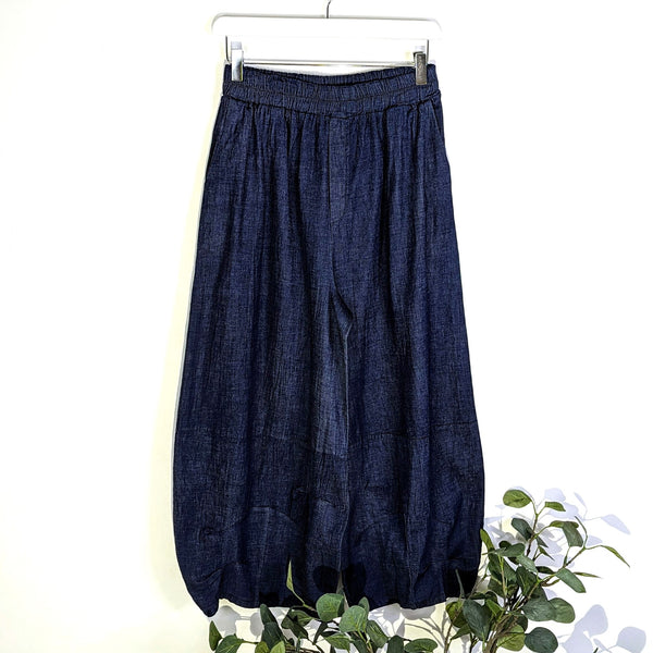 Balloon style denim trousers with pockets