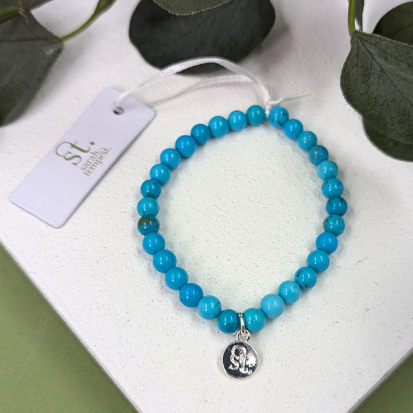 Semi-precious stone beaded bracelet with ST logo