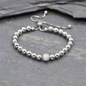 Delicate friendship bracelet with central round cz ball