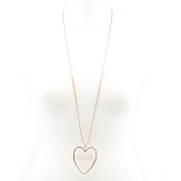 Organic heart pendant with little heart detail long necklace