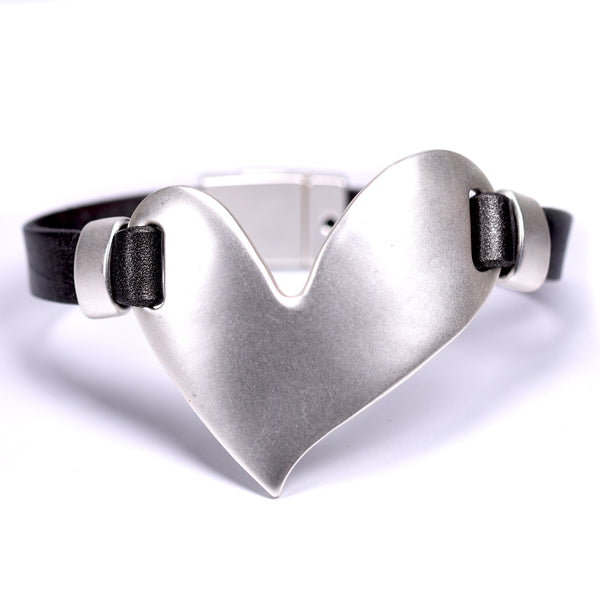 Leather bracelet with a large irregular heart feature