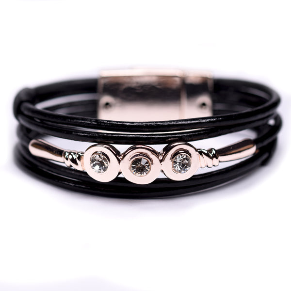 Leather bracelet featuring a triple crystal centre design