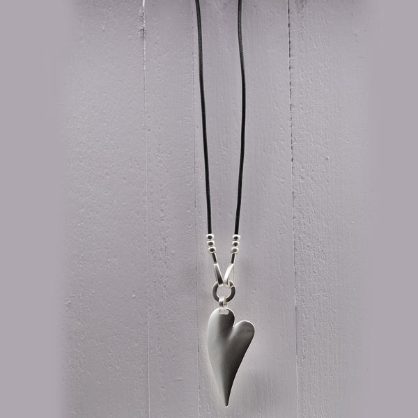 Long leather necklace with solid elongated heart pendant