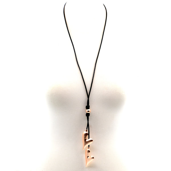 Long leather necklace with two asymmetrical heart pendants