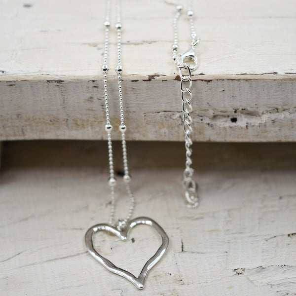 Short ball chain necklace with single cutout heart pendant