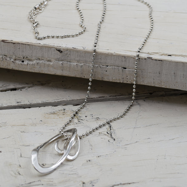 Double open organic shaped long pendant necklace