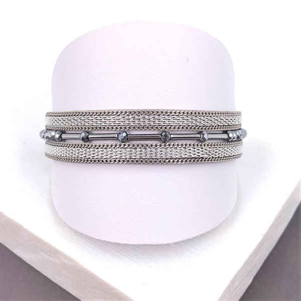 Multistrand magnetic bracelet with cut glass beads and tube strand