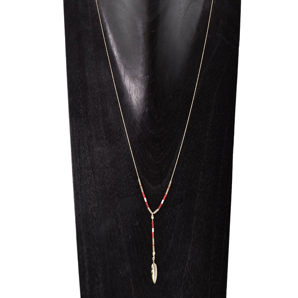 Delicate gold American indian style necklace with little fea