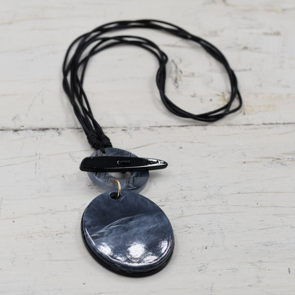 Oval grey marble resin pendant with T-bar feature on medium