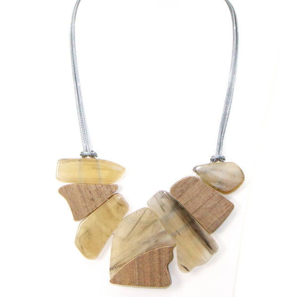 Organic shapes marble resin and integrated wood statement necklace