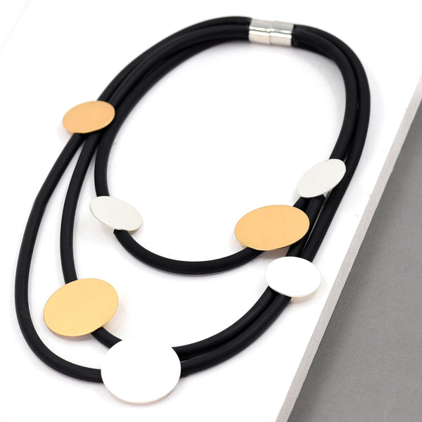 Triple strand neoprene necklace with circle pendants