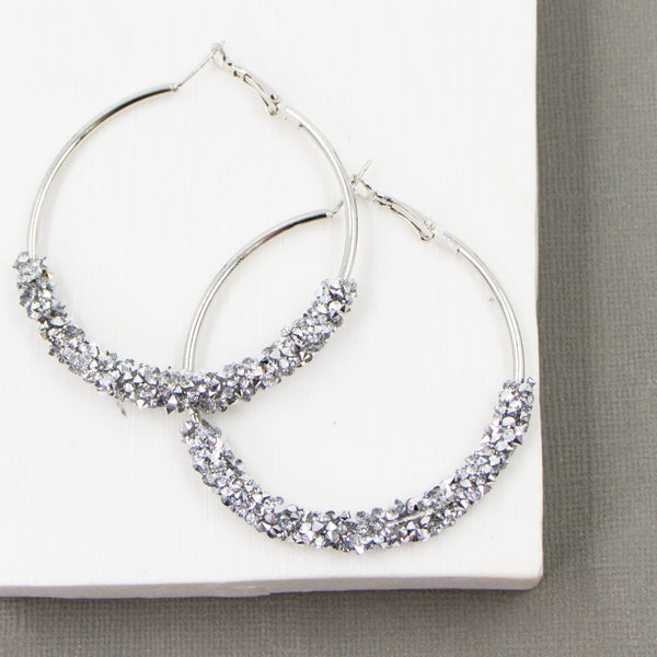 Hoop earrings with crystal encrusted section