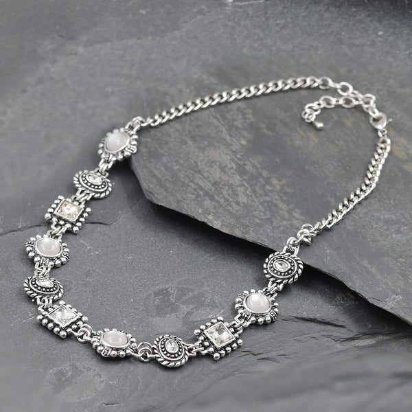 Antique silver necklace with alternating crystal features