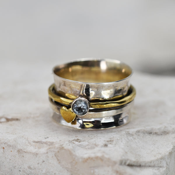 925 Spinning ring with blue topaz stone and brass heart - Size 10