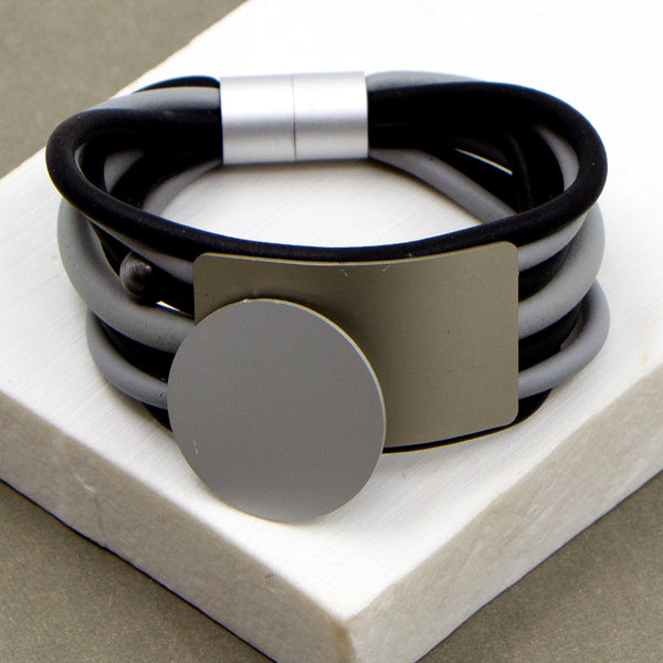 Multistrand neoprene bracelet with aluminium contemporary components