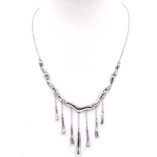 Segmented short necklace with staggered drop detail