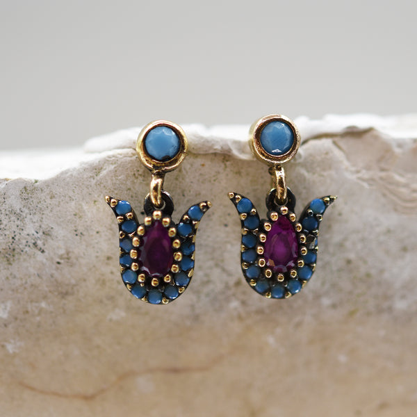 Tulip shape stud drop earrings with purple stone center