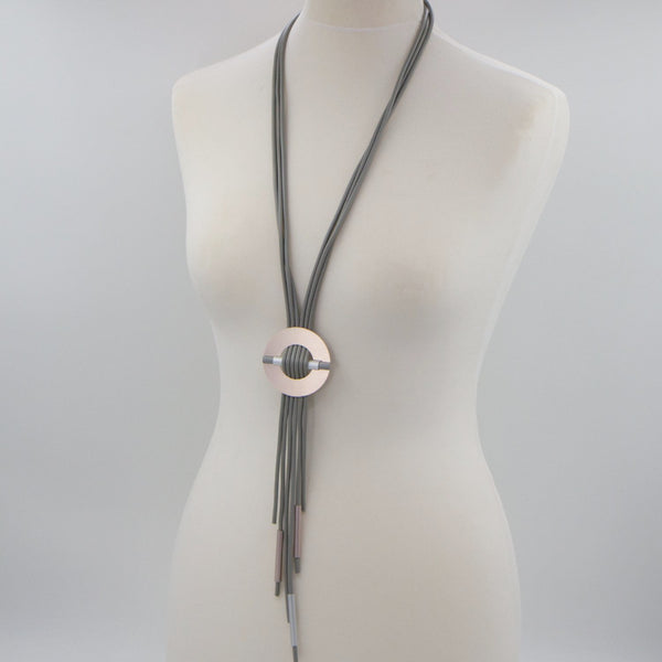 Long neoprene Y-shape necklace with circle and tube feature