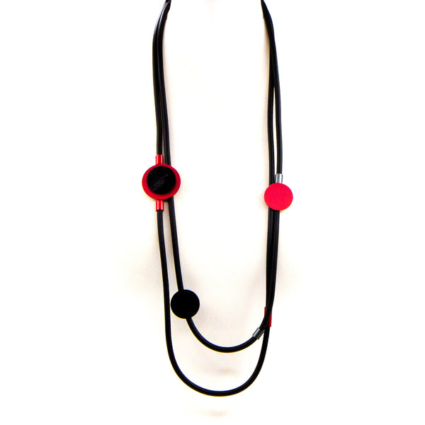 Double strand neoprene necklace with red disc and tube accents