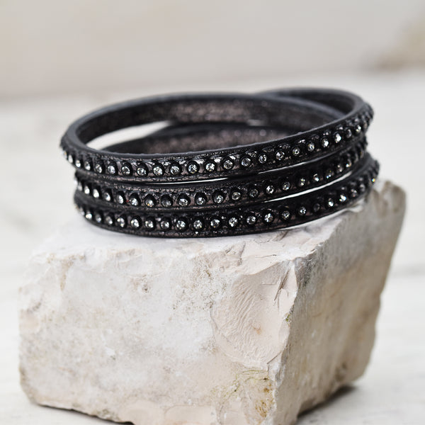 Dark grey triple wraparound bracelet with crystal strip