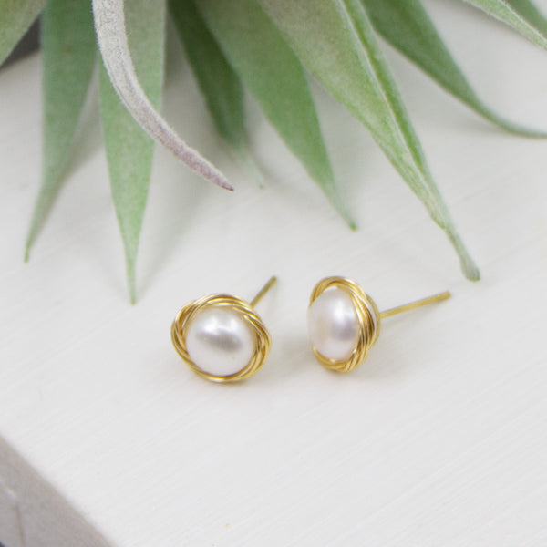 Real pearl stud earrings with gold surrounding