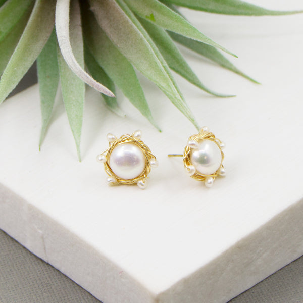 Real pearl stud earrings with gold surrounding and mini pearls