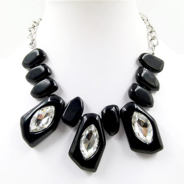 Statement resin pebbles wiht crystal detail on curb chain