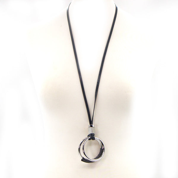 Long necklace with circle pendant and PU section detail