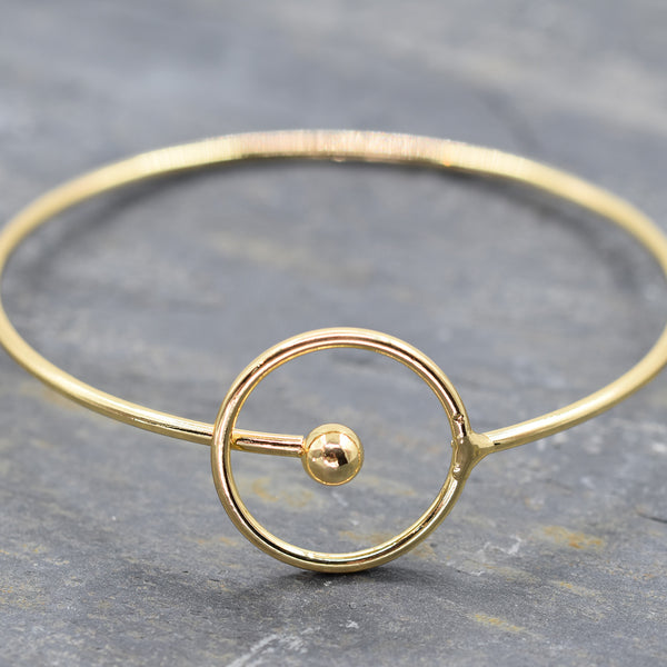 Simple circle crossover bangle