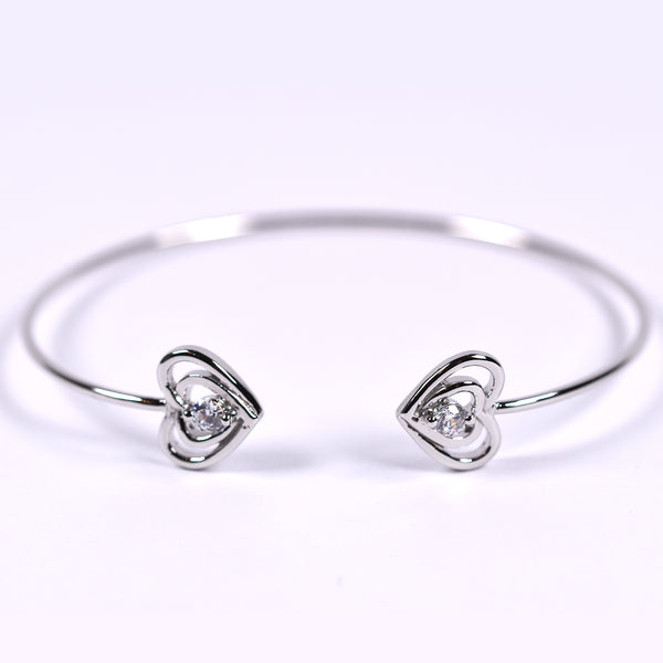 Open bangle with solid heart and crystals ends