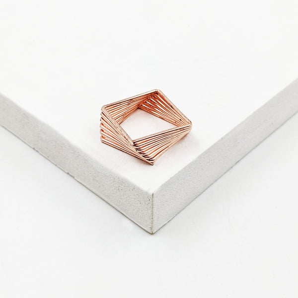 Twisted multi square ring