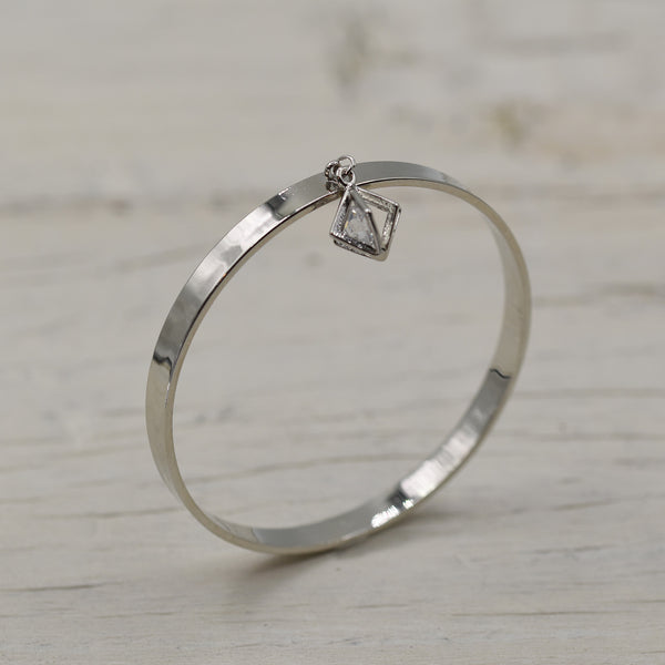 Delicate full bangle with caged crystal dropper