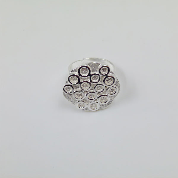 Statement ring with raised circle detail