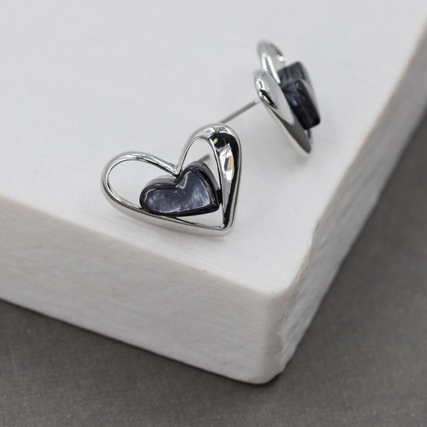 Open heart shape stud earrings wit grey resin middle