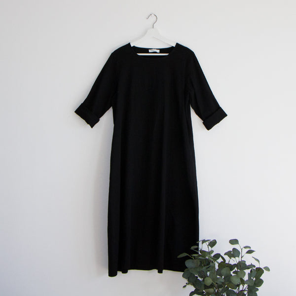 Plain smart dressy dress with inverted pockets