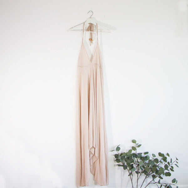 Maxi dress with a handkerchief hem and braided rope halterneck