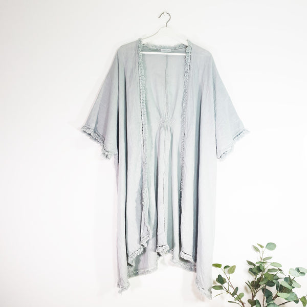 Long linen style kaftan with rouched back and tassle edge