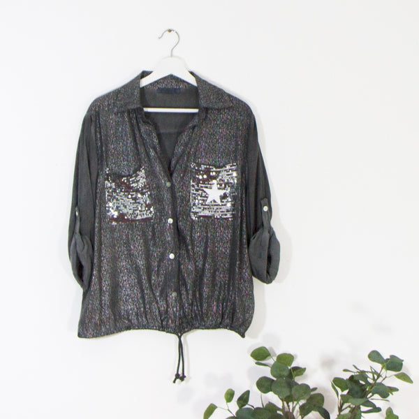 Special silver fabric shirt with sequin pocket and star motif