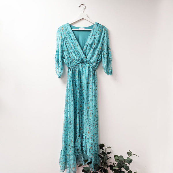 Elegant delicate flower print silk dress with high low ruffle hem