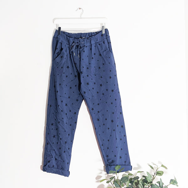 Super stretch star print trousers with pockets and drawstring waist