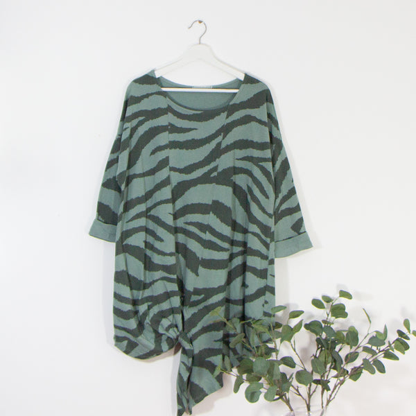 A-symmetric free size animal print with pull through detail