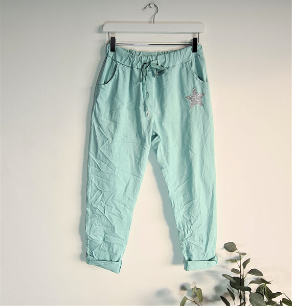 Super stretch trousers with silver star on pocket (M-L)