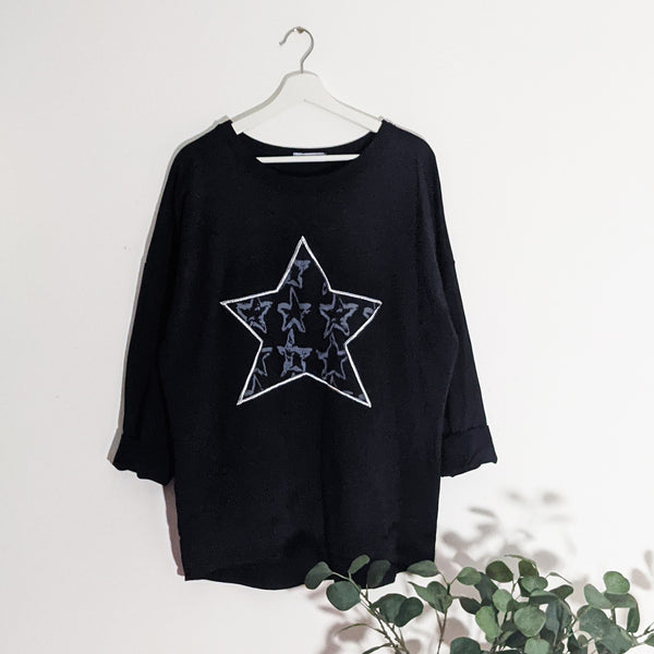 Long sleeve jersey top with silver embroidered star print fabric motif